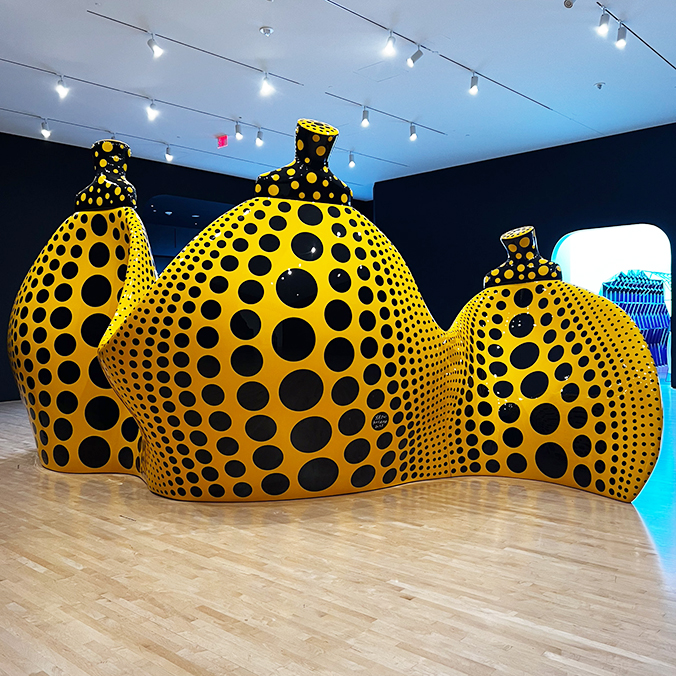 Installation of yellow and black abstract pumpkins